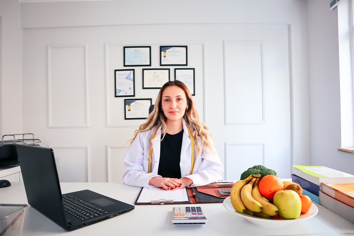 Nutritionist reviewing a personalized diet plan